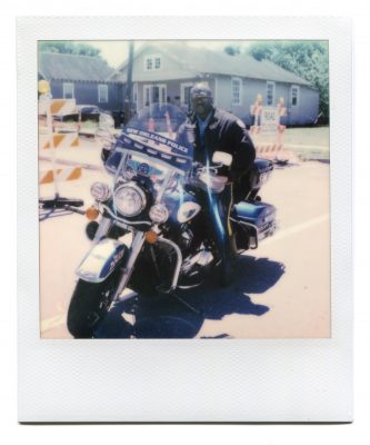 NOPD motorcycle cop. Polaroid by Florent Dudognon
