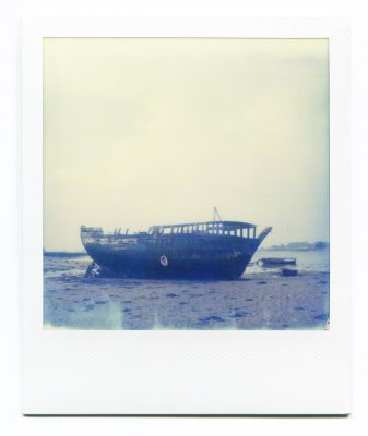 Boat wreck, France, Polaroid by Florent Dudognon